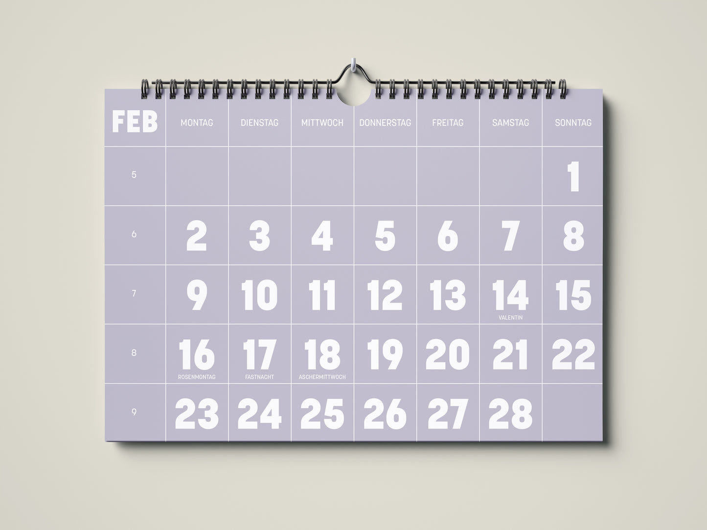 Kalender 2026: Bild eines Wandkalenders in Querformat DIN A4. Der Kalender ist minimalistisch. Jedes Kalenderblatt hat eine monatstypische Farbgebung auf weißer Schrift. Hier ist das Kalenderblatt von Januar zu sehen in der Farbe helles lavendel lila.