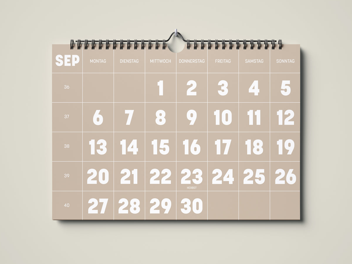 Kalender 2027: Bild eines Wandkalenders in Querformat DIN A4. Der Kalender ist minimalistisch. Jedes Kalenderblatt hat eine monatstypische Farbgebung auf weißer Schrift. Hier ist das Kalenderblatt von September zu sehen.